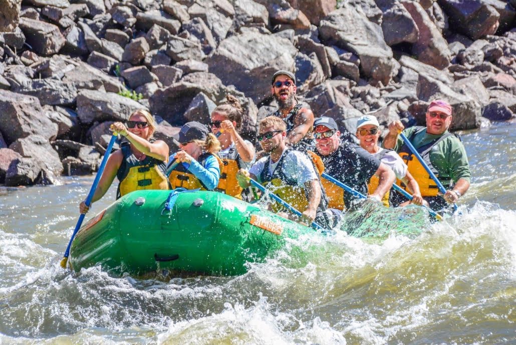 Paddling Through Rapid On The Colorado River