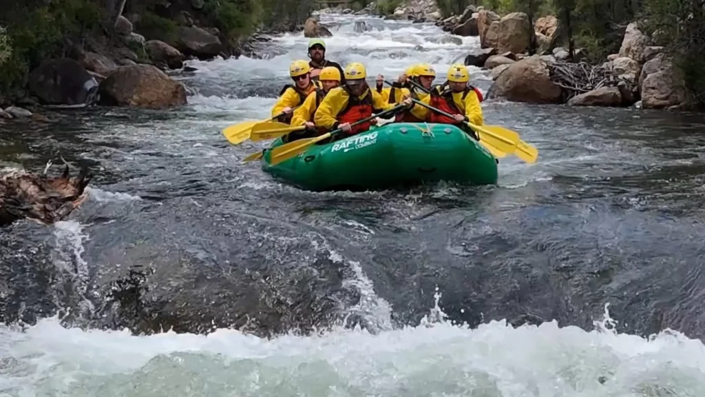 Rafters enjoying the high waters in spring with Colorado Rafting Company on Clear Creek.