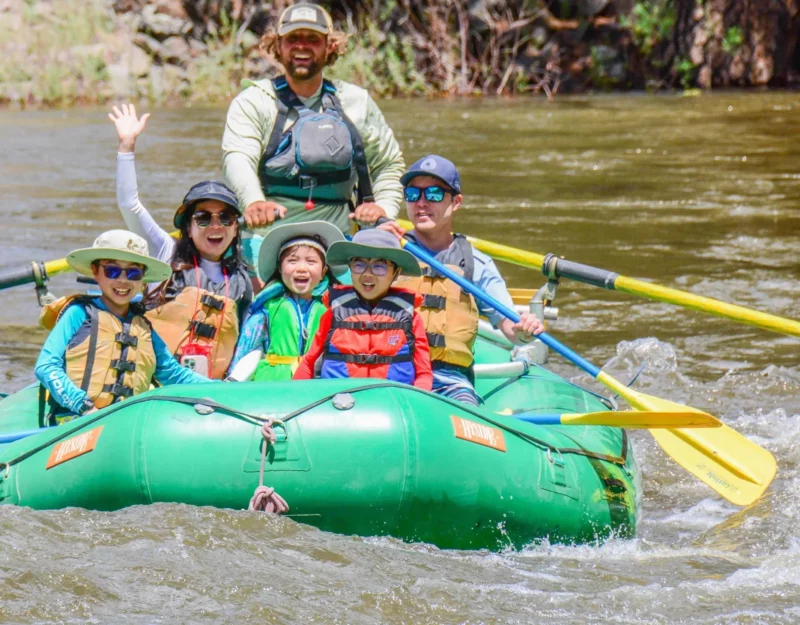 Family enjoying white water rafting in Dillon Colorado on a guided river adventure