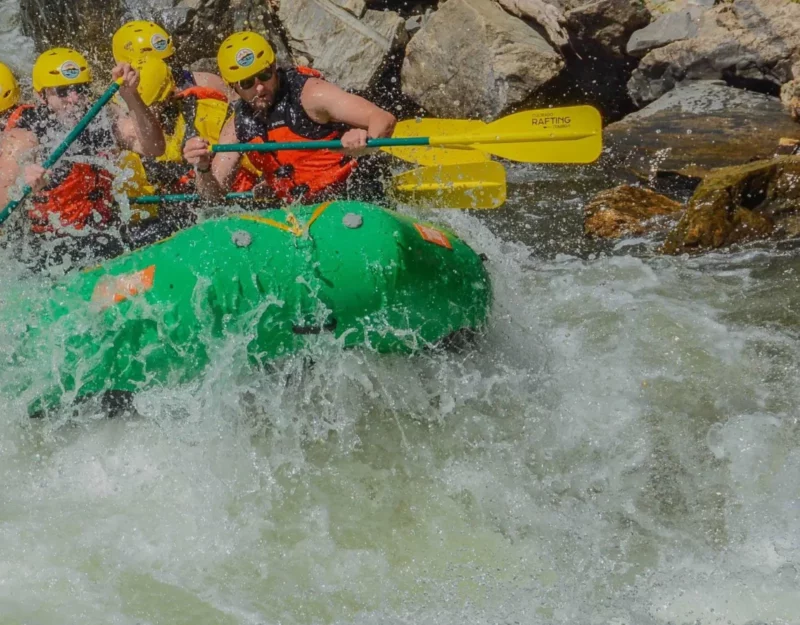 Advanced rafting trip in Steamboat Springs CO tackling fast-moving, high-adrenaline rapids