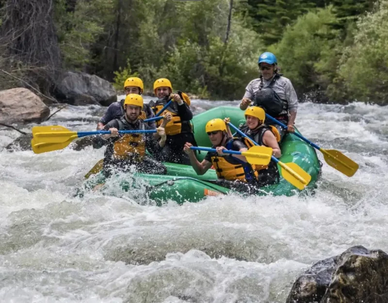 Group enjoying white water rafting near Winter Park CO on a family-friendly river section