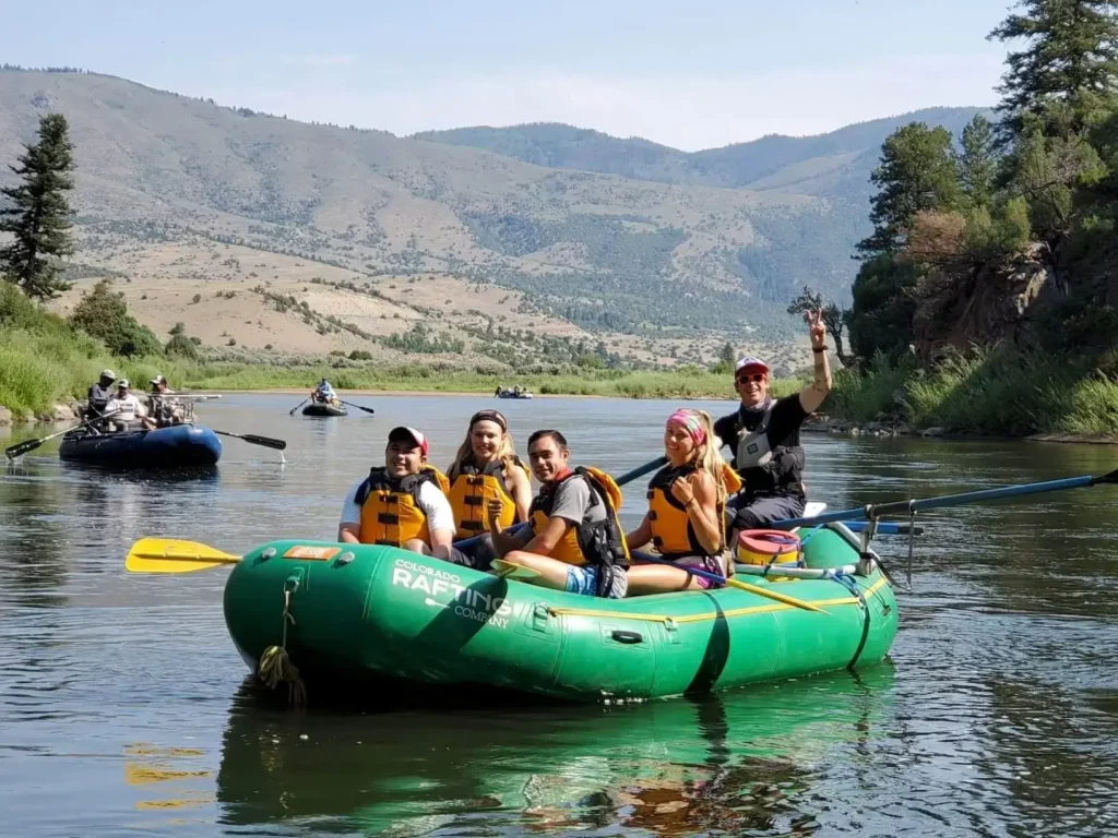 Whitewater rafting group on Upper Colorado River near Vail Class II-III rapids